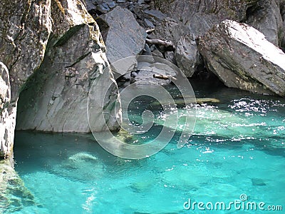 Blue water in underground cave Stock Photo