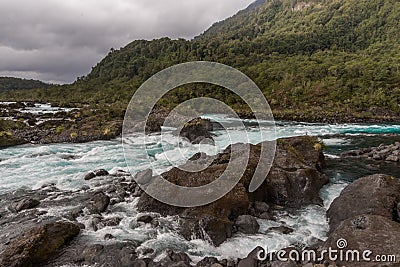 Blue waters of the Petrohue River in Chile Stock Photo