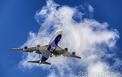 Blue and white aircraft Editorial Stock Photo
