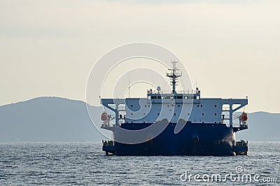 Blue and white colour project cargo ship anchors in the open sea Editorial Stock Photo