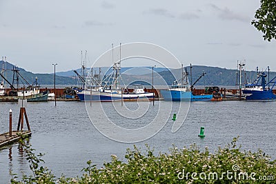 Blue and White Fishing Trawlers in Oregon Editorial Stock Photo