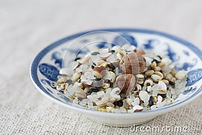The blue and white porcelain plate with all kinds of grain Stock Photo