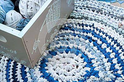 Blue and white rag rug and teeshirt wool Stock Photo