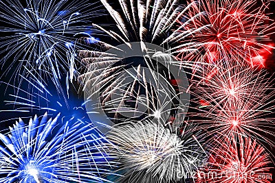 Blue white and red fireworks background Stock Photo