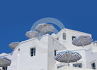 Blue white sunshade umbrellas Stock Photo