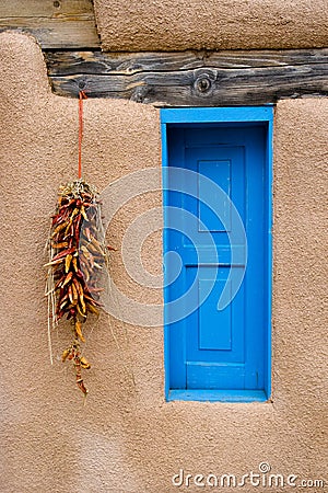 Blue Window and Red Pepper Ristra Stock Photo