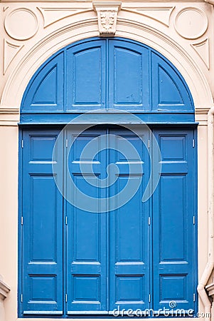 Blue wooden door in the folding style. Stock Photo