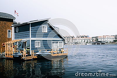 Blue wooden house on the water at Fishermans wharf Stock Photo