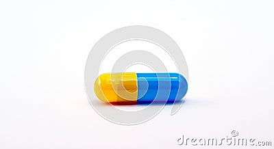 Blue-yellow capsule Stock Photo