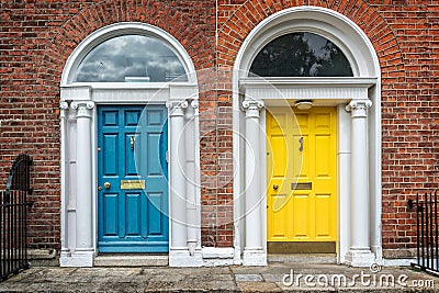 Blue and yellow classic doors in Dublin example of georgian typical architecture of Dublin, Ireland Stock Photo