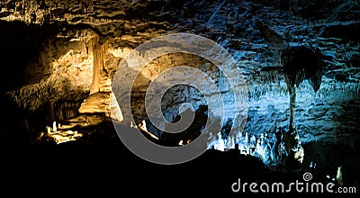 Blue and yellow lights in a fantastic cave in Europa Stock Photo