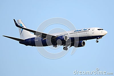 Blueair jet flying up in the sky Editorial Stock Photo