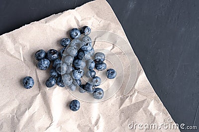 Blueberry antioxidant organic superfood in a paper packaging concept for healthy eating and nutrition Stock Photo