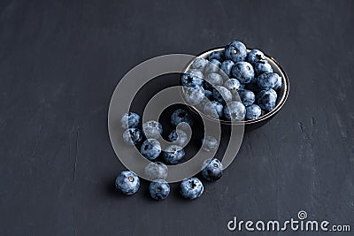 Blueberry antioxidant organic superfood in a paper packaging concept for healthy eating and nutrition Stock Photo