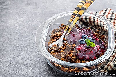 Blueberry crisp baked oatmeal on gray Stock Photo