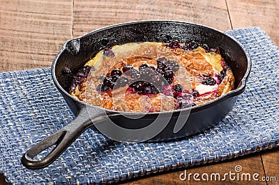 Blueberry croissant breakfast in skillet Stock Photo