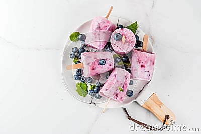 Blueberry ice cream popsicles Stock Photo