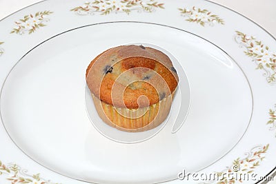 Blueberry Muffin on plate Stock Photo