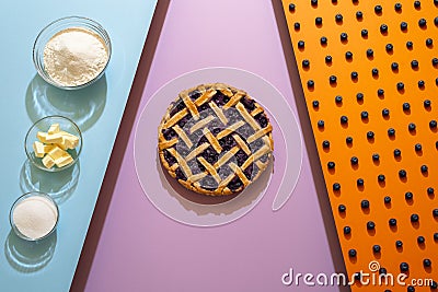 Blueberry pie and ingredients. Making blueberries pie with lattice crust Stock Photo