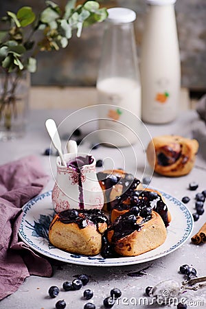 Blueberry scone with Cinnamon Cream Cheese Glaze Stock Photo