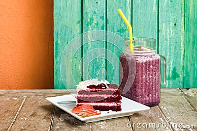 Blueberry smoothie in jar with red velvet cake Stock Photo