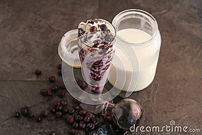 Blueberry vanilla ice cream chocolate shake served in glass isolated on table side view of healthy drink Stock Photo