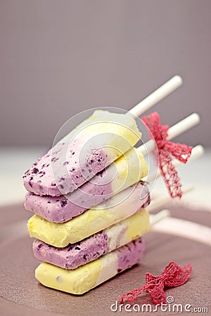Blueberry and vanilla ice cream popsicles Stock Photo
