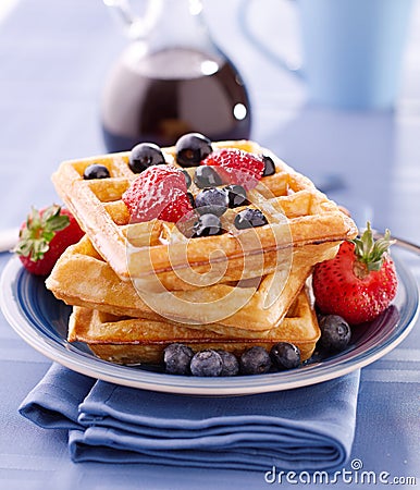 Blueberry waffles with strawberries Stock Photo