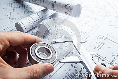 Blueprint rolls and set of construction tools Stock Photo