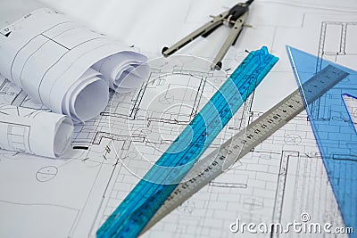 Blueprint with ruler, pencil and thumbscrew compasses Stock Photo