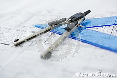 Blueprint with ruler and thumbscrew compasses Stock Photo