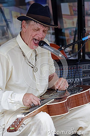 Bluesman Watermelon Slim plays slide guitar Editorial Stock Photo