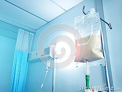 Bluetone of Enteral feeding bag on IV pole Stock Photo