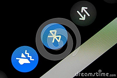 Bluetooth icon on a mobile device smartphone tablet screen display, BT and BLE module connectivity features simple concept, nobody Editorial Stock Photo