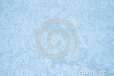 Bluish-gray ice in an openwork pattern of glowing ice veins. Natural background Stock Photo