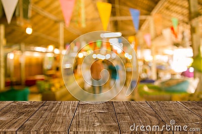 Blur festival background with wooden table top Stock Photo