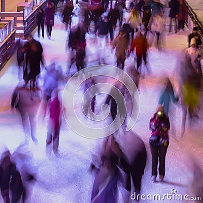 Blur image with people, winter, friendship, sport and leisure concept - skating on rink outdoors Stock Photo