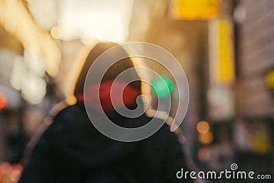 Blur image of unrecognizable female person on the street Stock Photo