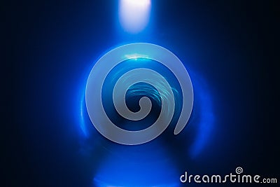 Blur neon blue arc glow lens flare tunnel effect Stock Photo