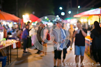 Blur picture of people walk in the street night maket. Stock Photo