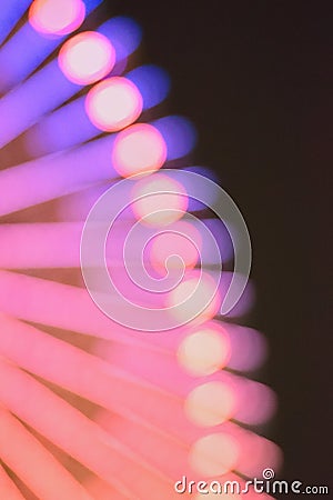 Blur texture of colorful carnival ferry wheel lights Stock Photo