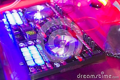 Motion Blur turntablism turntables plate mixer night party pub with light Stock Photo