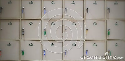 Blur White lockers with a keys and number for save value things Stock Photo