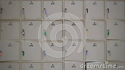 blur white lockers with a keys and number for save value things Stock Photo