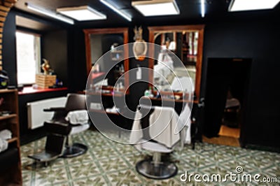 Blured photo of interior and chairs at barbershop. Barber soul Stock Photo