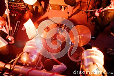 Blured photo of music band on stage, view from above. Stock Photo