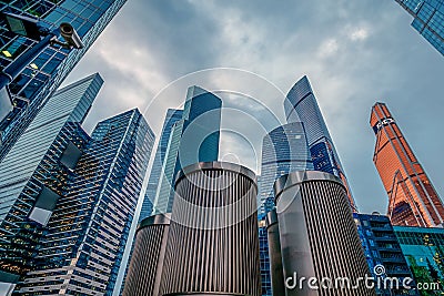 Blured view of modern corporate buildings against the gloomy sky. high-rise buildings and skyscrapers Moscow International Busines Editorial Stock Photo