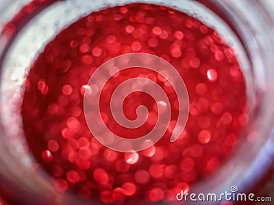 Blurred abstract background circular red sparkling sequins Stock Photo