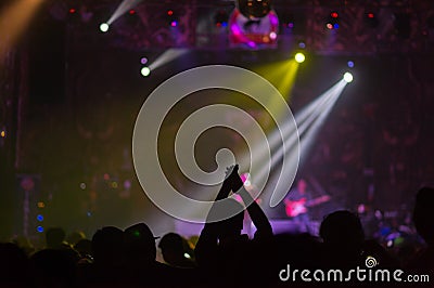 Blurred background : Bokeh lighting in outdoor concert with cheering audience Stock Photo