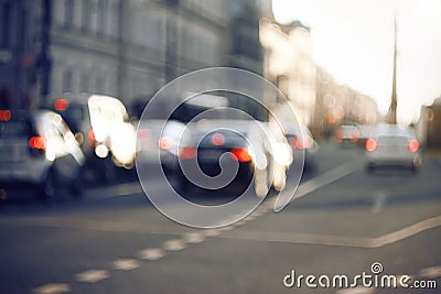 Blurred background with cars driving along the Avenue Stock Photo